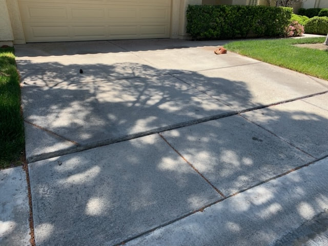concrete driveway before getting repaired