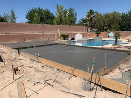 concrete walkway and pool deck for home