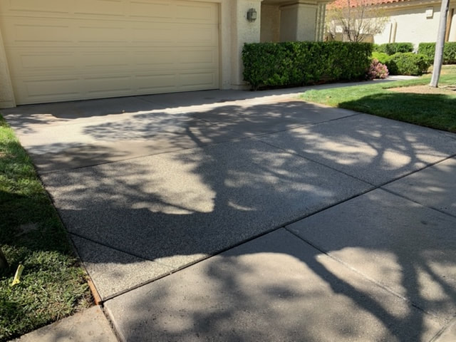 concrete driveway after being all repaired